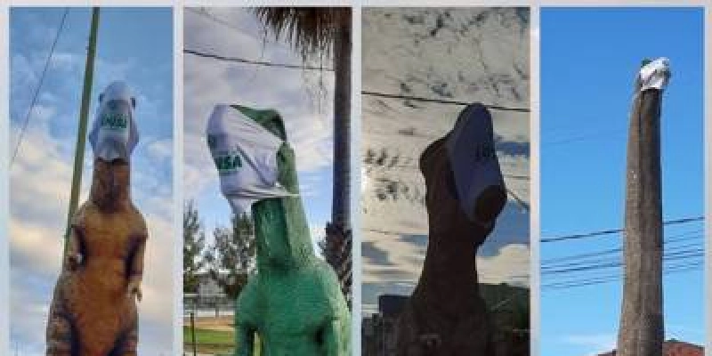 Prefeitura de Sousa veste máscaras nas réplicas de dinossauros, como forma de chamar a atenção da população sobre o momento de pandemia