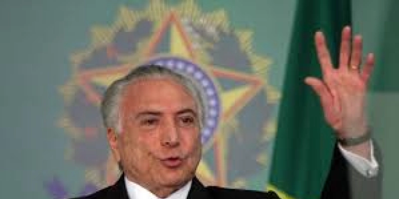 Temer diz na Guatemala que Brasil faz transição branda e tranquila