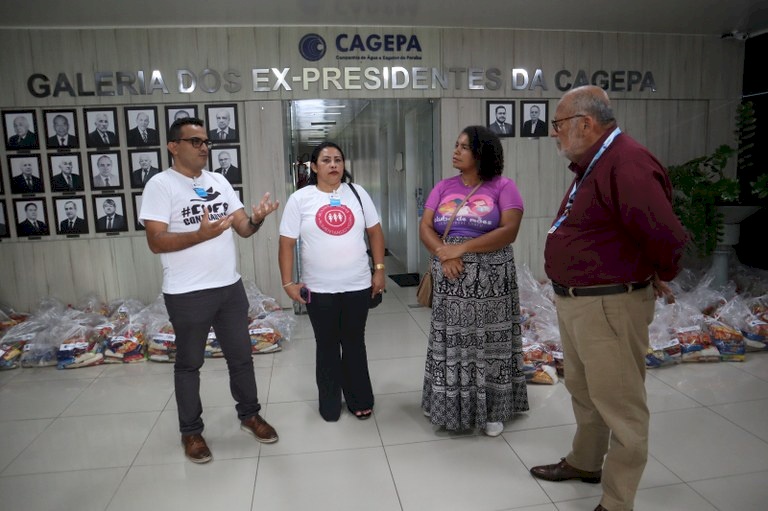 Famílias de comunidades de João Pessoa recebem alimentos arrecadados na Corrida das Águas