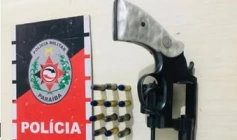 Arma e munições apreendidas em ação da PM