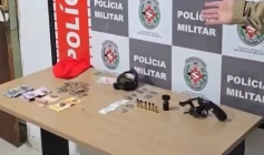 Arma e munições apreendidas em ação da PM