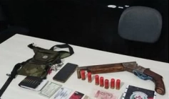 Arma e munições apreendidas em ação da PM