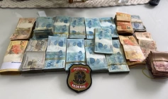 Dinheiro apreendido em operação que apura fraude em licitação