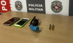 Arma e munições apreendidas em ação da PM