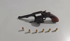 Arma e munições apreendidas em ação da PM