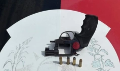 Arma e munições apreendidas em ação da PM