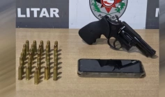 Arma e munições apreendidas em ação da PM