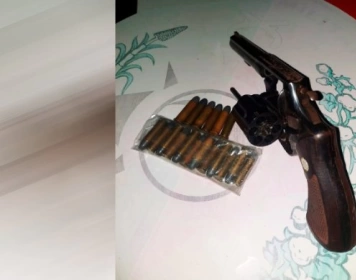 Arma e munições apreendidas em ação da PM