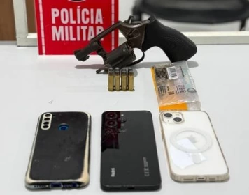 Apreensão de revólver calibre, oito munições intactas e porção de maconha