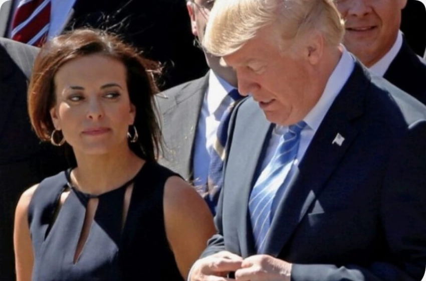 Imagem Dina Powell McCormick ao lado de Trump