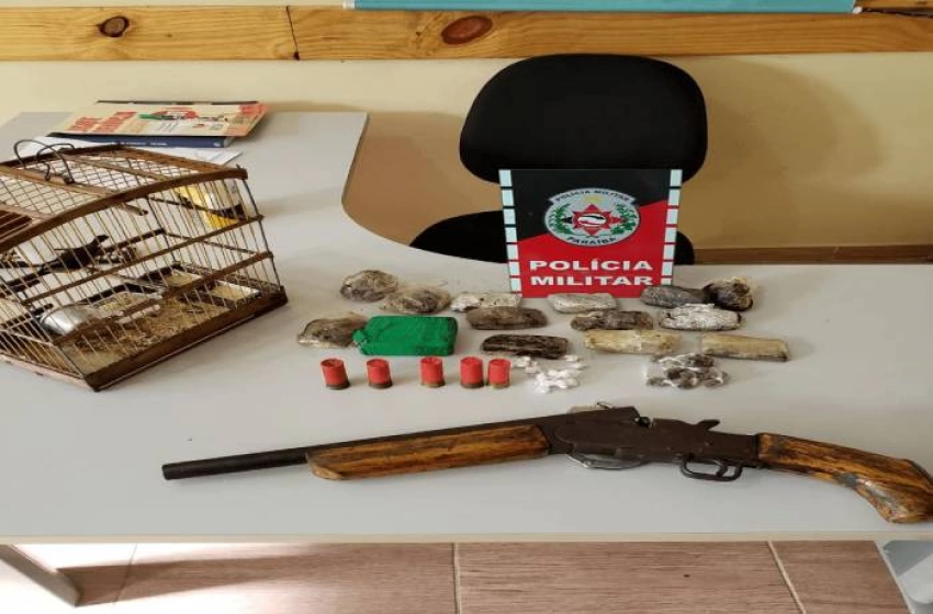 Imagem Arma, munições e drogas