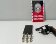 Arma e munições apreendidas em ação da PM