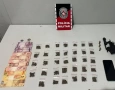 Arma e drogas apreendidas em ação da PM