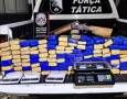 Apreensão de 145 tabletes de maconha e espingarda
